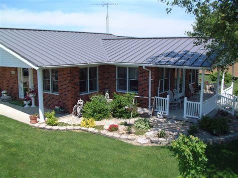 pics of brick houses with metal roofs|metal roof on brick ranch.